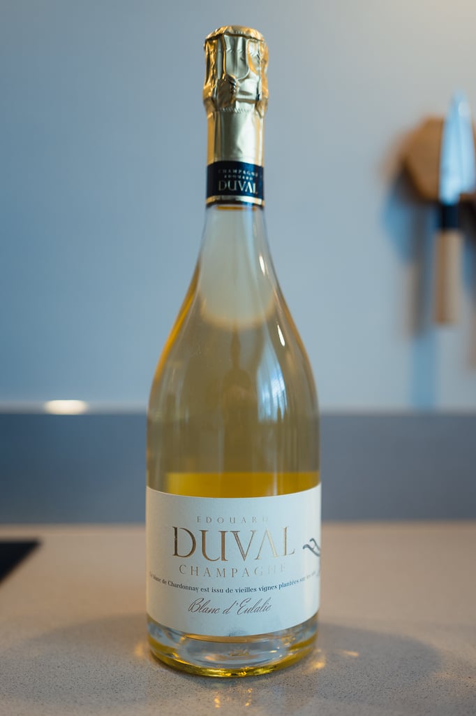 Edouard Duval Blanc d'Eulalie bottle with gold foil and cream label standing on a counter