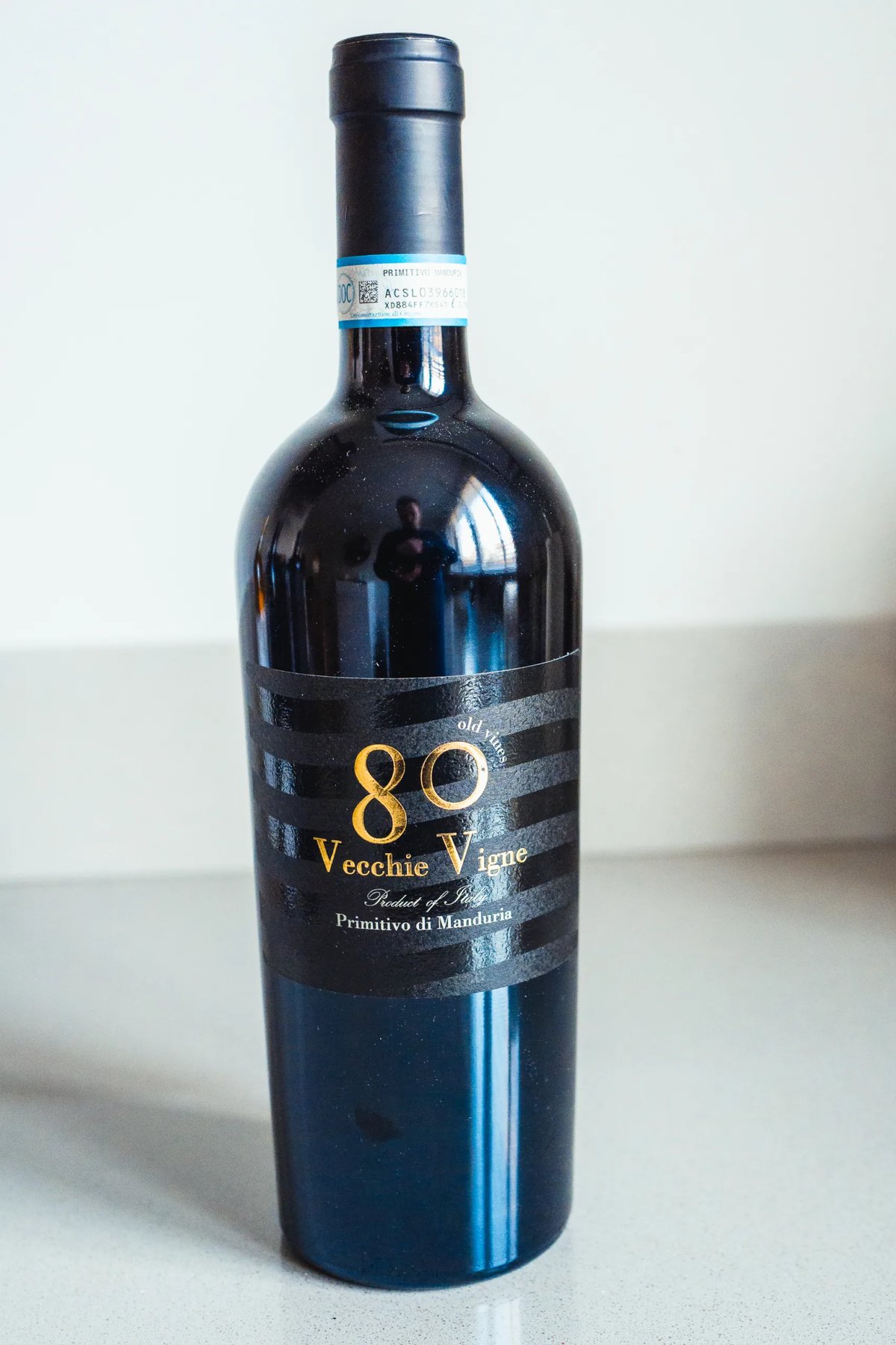 Cignomoro 80 Vecchie Vigne Primitivo di Manduria red wine in a heavy dark bottle