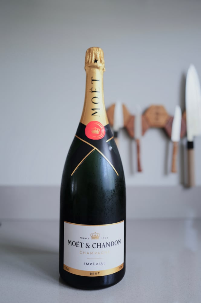 Magnum of Moët & Chandon Brut Impérial with white label and gold neck, ready for the tasting