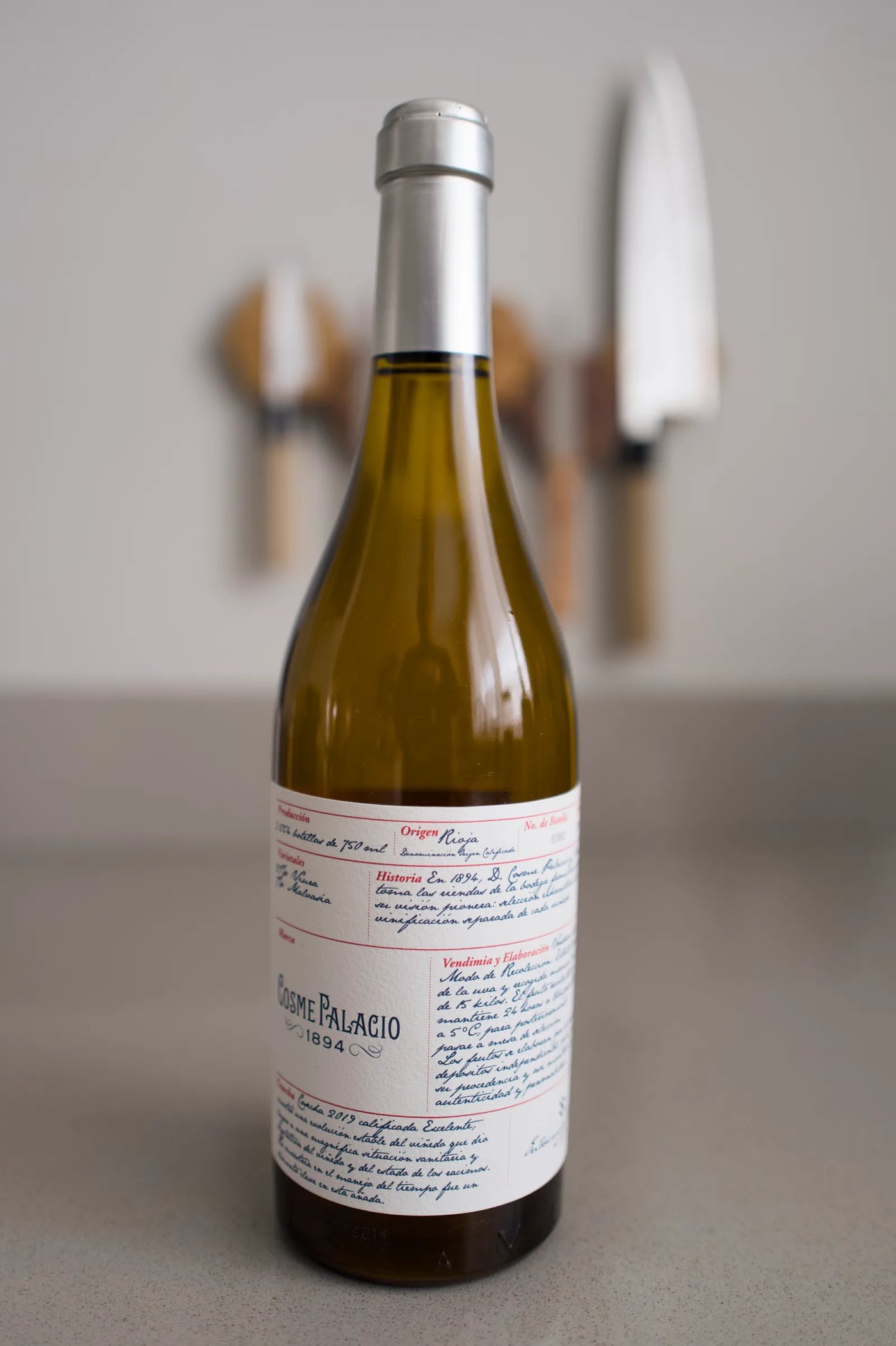 Bottle of Cosme Palacio 1894 Blanco white Rioja with a handwritten label
