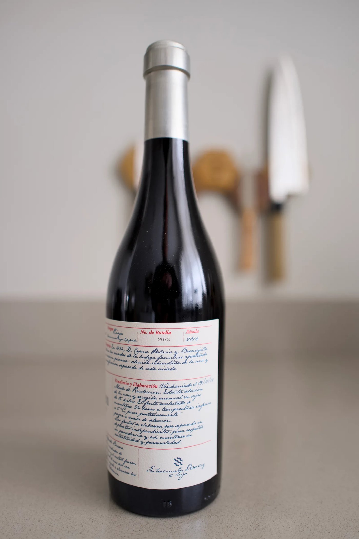 Bottle of Cosme Palacio 1894 Tinto 2019 red Rioja with a handwritten label