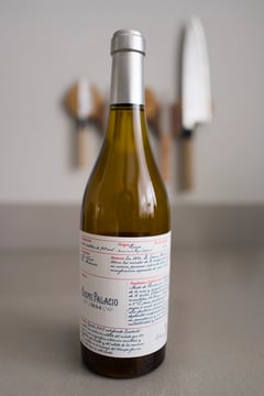 Bottle of Cosme Palacio 1894 Blanco white Rioja with a handwritten label