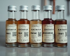 Collection of Dumangin Ratafia Champenois bottles from Champagne J. Fils in Chigny-les-Roses