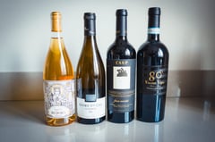 Exploring Luxury Grapes: A Unique Wine Experience with four very diverse bottles, wineshop