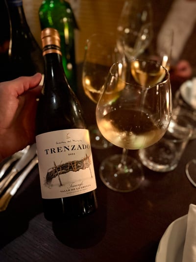 Wine glasses and dishes at Toet Amsterdam, a Mediterranean restaurant on Europaplein