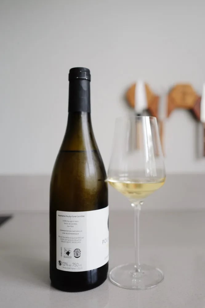 Back label of Pouilly-Fumé Caillottes 2023 listing terroir de caillottes, natural fermentation and 13 percent